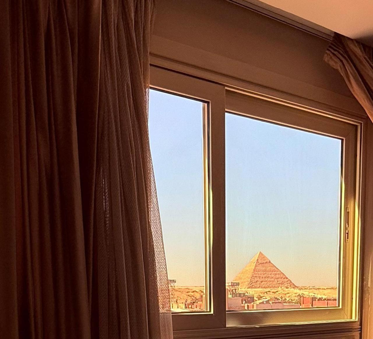 Topaz Pyramids View Inn Kafret el-Gabal エクステリア 写真
